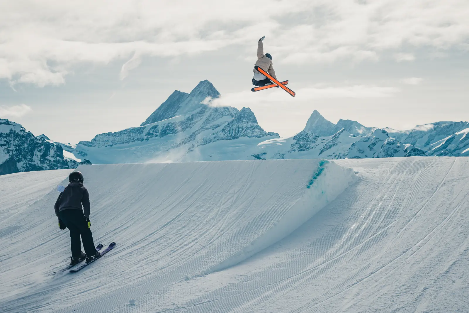 Freeskier doing a backflip in front of the Schreckhorn